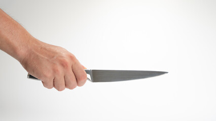 A man's right hand holds a kitchen knife gesture
