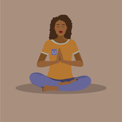 Young black woman with dark curly hair is doing yoga