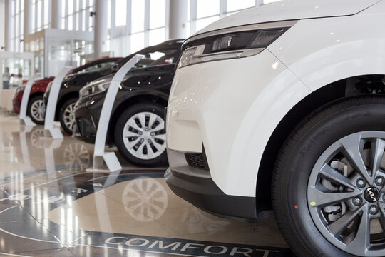 Russia, Izhevsk - February 17, 2022: KIA showroom. New modern cars in dealer showroom. Famous world brand.