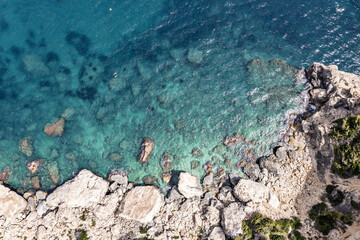Aerial view of waves splashing on beach