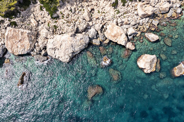 Aerial view of waves splashing on beach
