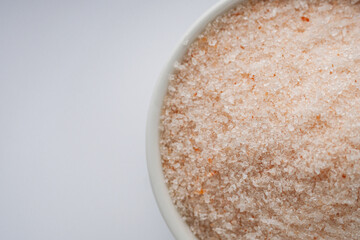 pink Himalayan salt on a white background