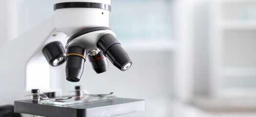 Modern microscope in scientific laboratory, closeup