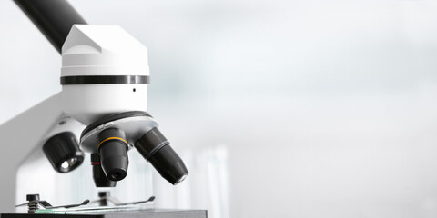 Modern microscope in scientific laboratory, closeup