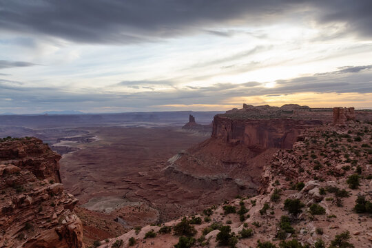 Scenic American Landscape and Red Rock Mountains in Desert Canyon. Spring Season. Sunset Sky. Canyonlands National Park. Utah, United States. Nature Background.