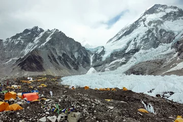 Papier Peint photo autocollant Everest khumbu icefall glacier mount everest base camp orange tents mountain climbing nepal base camp trek