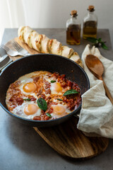 shakshuka is the spicy vegetable dish with poached eggs