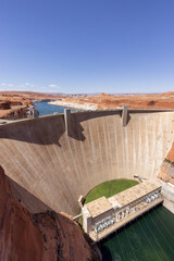 Glen Canyon Dam and Colorado River in Page, Arizona, United States of America. American Mountain Nature Landscape Background. Sunny Blue Sky Day.
