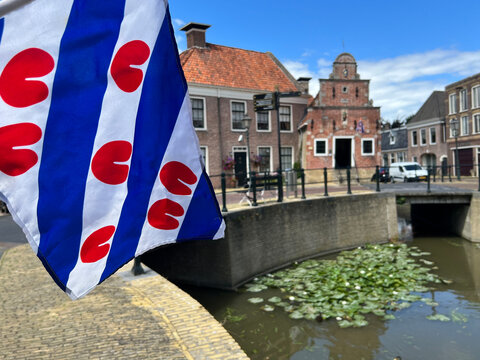 Frisian flag with the Grain Carrier&rsquo;s Cottage