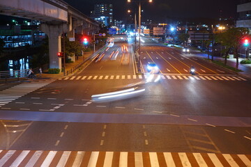 Slow shutter speed car lights, City scape of Naha in Okinawa, japan - 日本 沖縄 那覇の街並み 夜 道路 