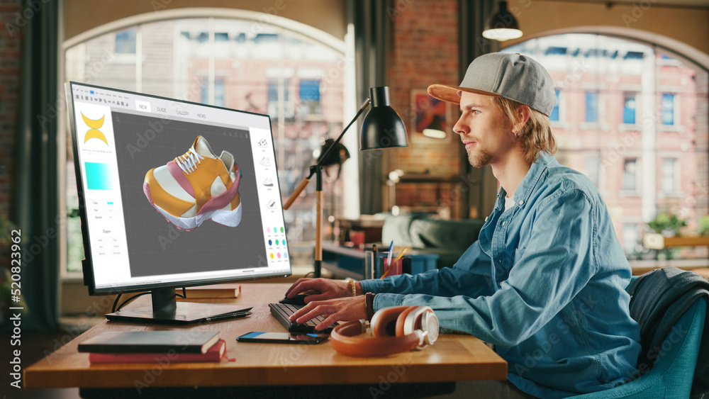 Aufkleber Caucasian Man Design Video Game at His Personal Computer in a Creative Office. Man Designing Clothing For Charachter on His Desktop Computer. Game with Graphics and Social Media Metaverse Gameplay.