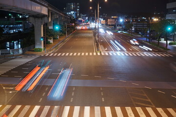 Slow shutter speed car lights, City scape of Naha in Okinawa, japan - 日本 沖縄 那覇の街並み 夜 道路 