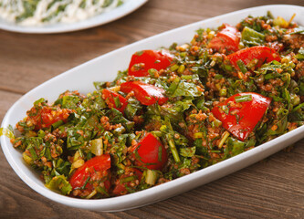 oriental tabbouleh salad on a wooden table
