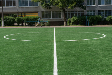 Marking on a modern stadium with artificial turf. School stadium.