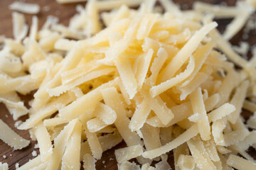 Heap of grated parmesan, healthy food, dairy product