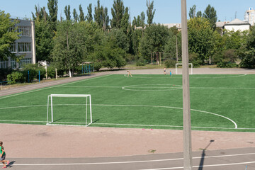 Marking on a modern stadium with artificial turf. School stadium.