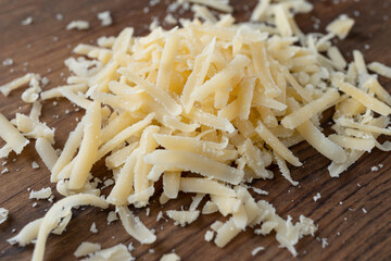 Heap of grated parmesan, healthy food, dairy product