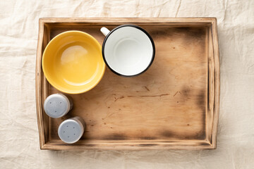 Empty dinner bowls in a wooden serving box. Food and catering concept. Open container for food