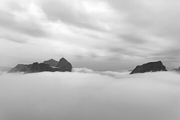 View from Mount Hesten in fog from Hesten trail to the Segla mountain on Senja island in northern Norway.