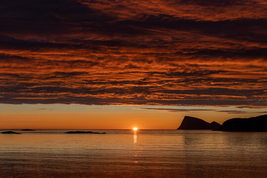 beautiful atmosphere of midnight sun at Sommaroy island (Sommar&oslash;y) with Haja (H&aring;ja) island in the background, Tromso Norway