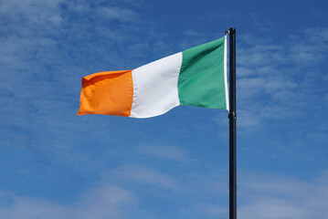 Ireland flag in the blue sky
