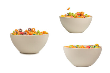 Colorful cereal box for morning breakfast. Corn flakes falling to the white bowl. Motion.