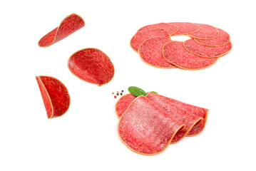 Falling salami isolated on white background.