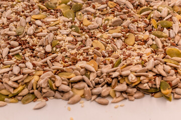 Mix of seeds for a salad. A pile of mixed seeds.