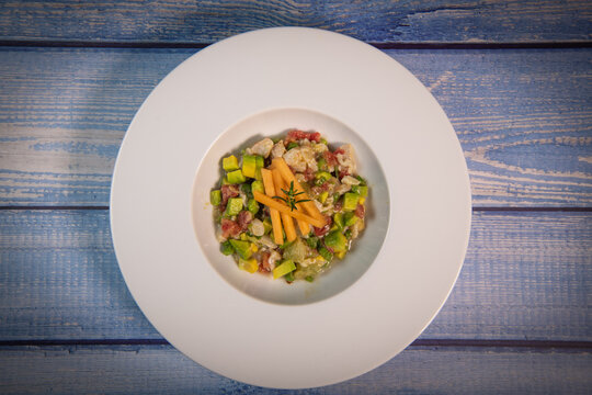 Recipe for ceviche of sea bream with avocado, chilli and lime. High quality photo