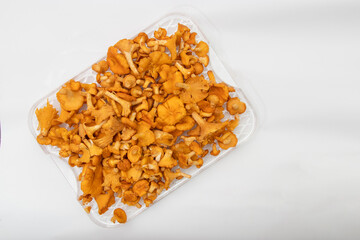 Fresh chanterelle mushrooms on a white background, isolated on white background.