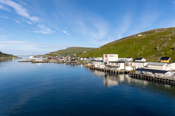 Fototapeta na wymiar Havøya (Havoya) seen from Norwegian coastal express Hurtigruten. Old postal ship now used as a cruise in the Norwegian sea.