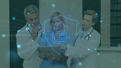 Animation of online security padlock over diverse doctors using tablet