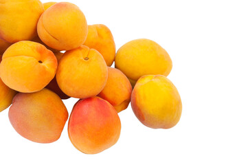 Beautiful apricots on a white texture. Isolated ripe peaches. Juicy white plums on a light background. Fruit growing concept.