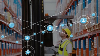 Animation of networks of connection with people icons over caucasian man working in warehouse