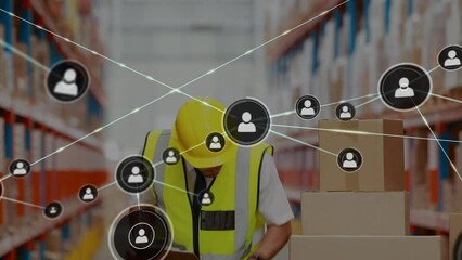 Animation of networks of connection with people icons over caucasian man working in warehouse