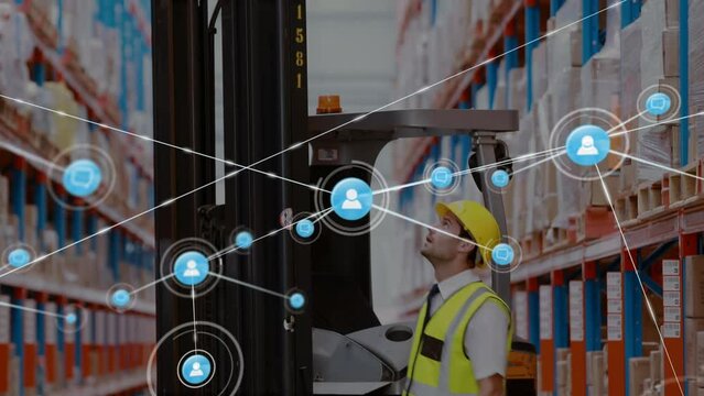 Animation of networks of connection with people icons over caucasian man working in warehouse