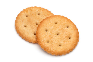 Healthy whole wheat cracker on white background. Stack of Saltine crackers isolated on white background. Round crackers.