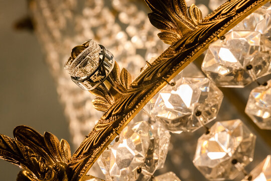 Wedding Rings On Gold Chandelier 