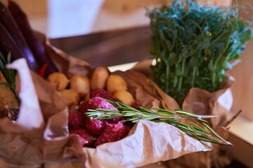 Assortment of a large number of different delicacies. Cheeses, sausages, canned food and bread, herbs and sauces.