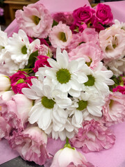 Beautiful big pink bouquet with pink roses and white chrysanthemums 