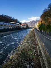 The channel for the Mzymta river built in Rosa Khutor on the background of mountains