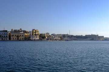 Fototapeta na wymiar view of the historic center of Brindisi, Italy. Sea view of the skyline