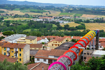 panorama and modern walkway of peccioli tuscany italy