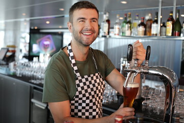 Bartender serving a refreshing looking beer