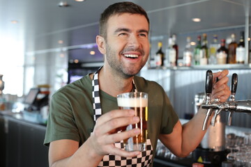 Bartender serving a refreshing looking beer