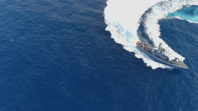 Navy ship in action Full speed Performing maneuvers, aerial
The Idf Dabur is a class of patrol boats built in the United States for the Israeli Navy, 2022, drone view
