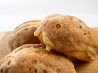 Bun with cheese. Fresh buns stuffed with cheese.