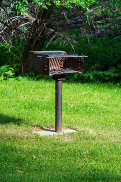 Public Barbecue or BBQ Grill in a public park on a sunny day