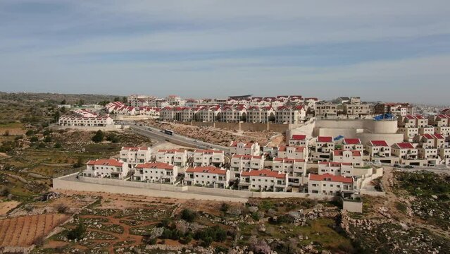 Efrat settlement with red rooftops, Aerial, West Bank ,2022
Drone view over Efrat or Efrata Settlement with red rooftops,located in the Judean Mountains of the West Bank
