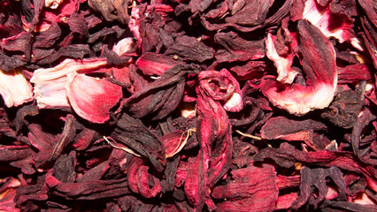 Karkade.Herbal drink made from Sudanese rose flowers.Background of hibiscus tea leaves.